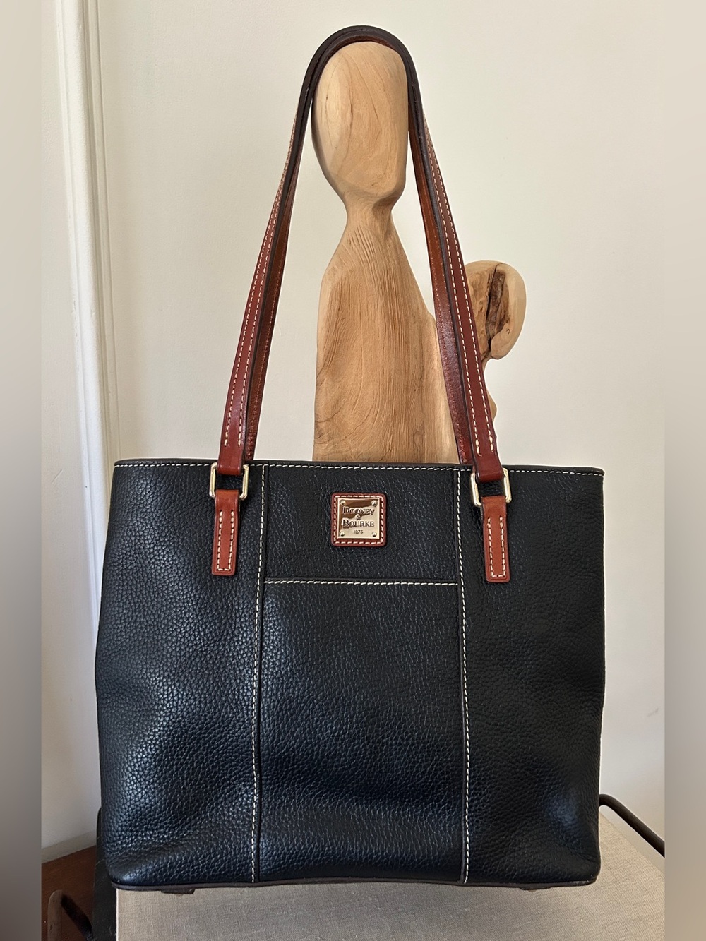 Dooney & Bourke Black Pebbled Leather Tote with Brown Straps and White Stitching